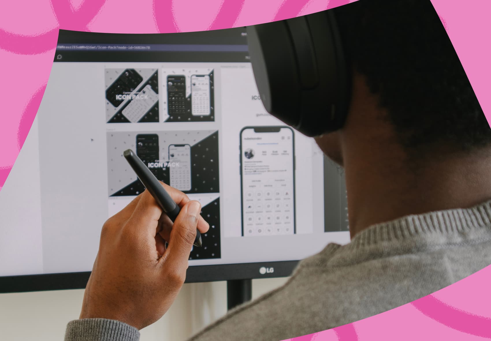 Man with headphones on looking at computer screen