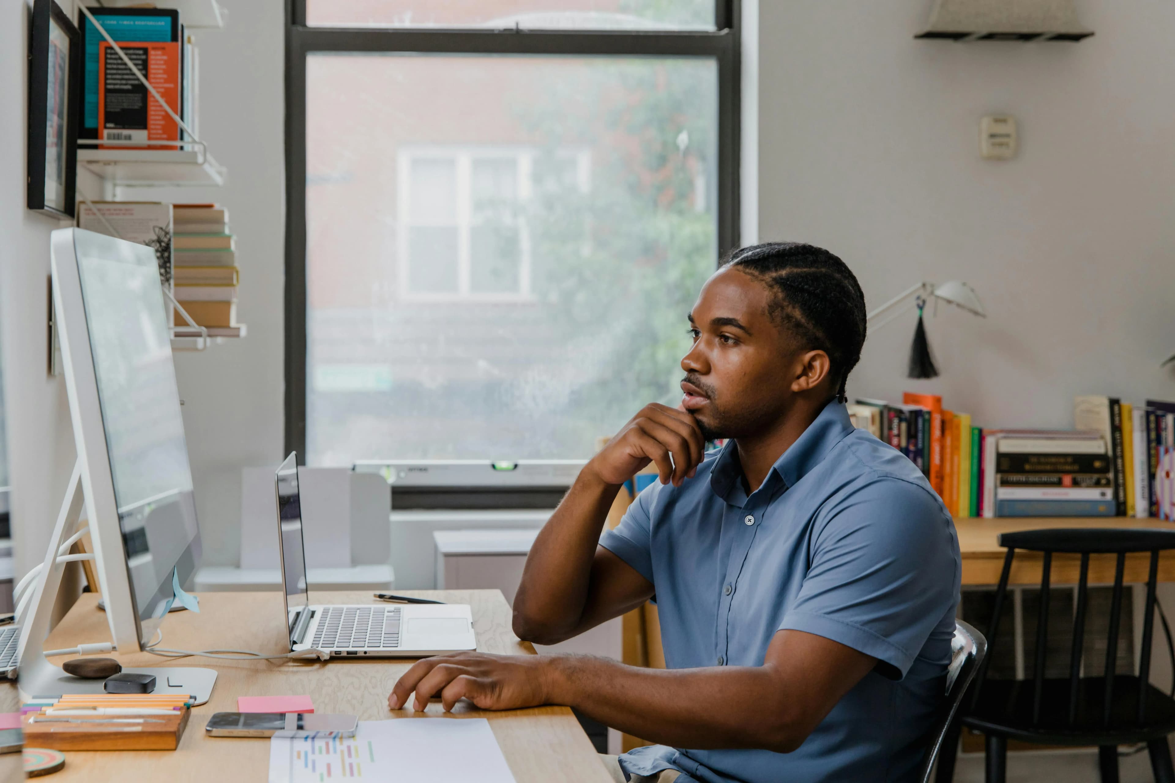 Man sitting at desktop computer